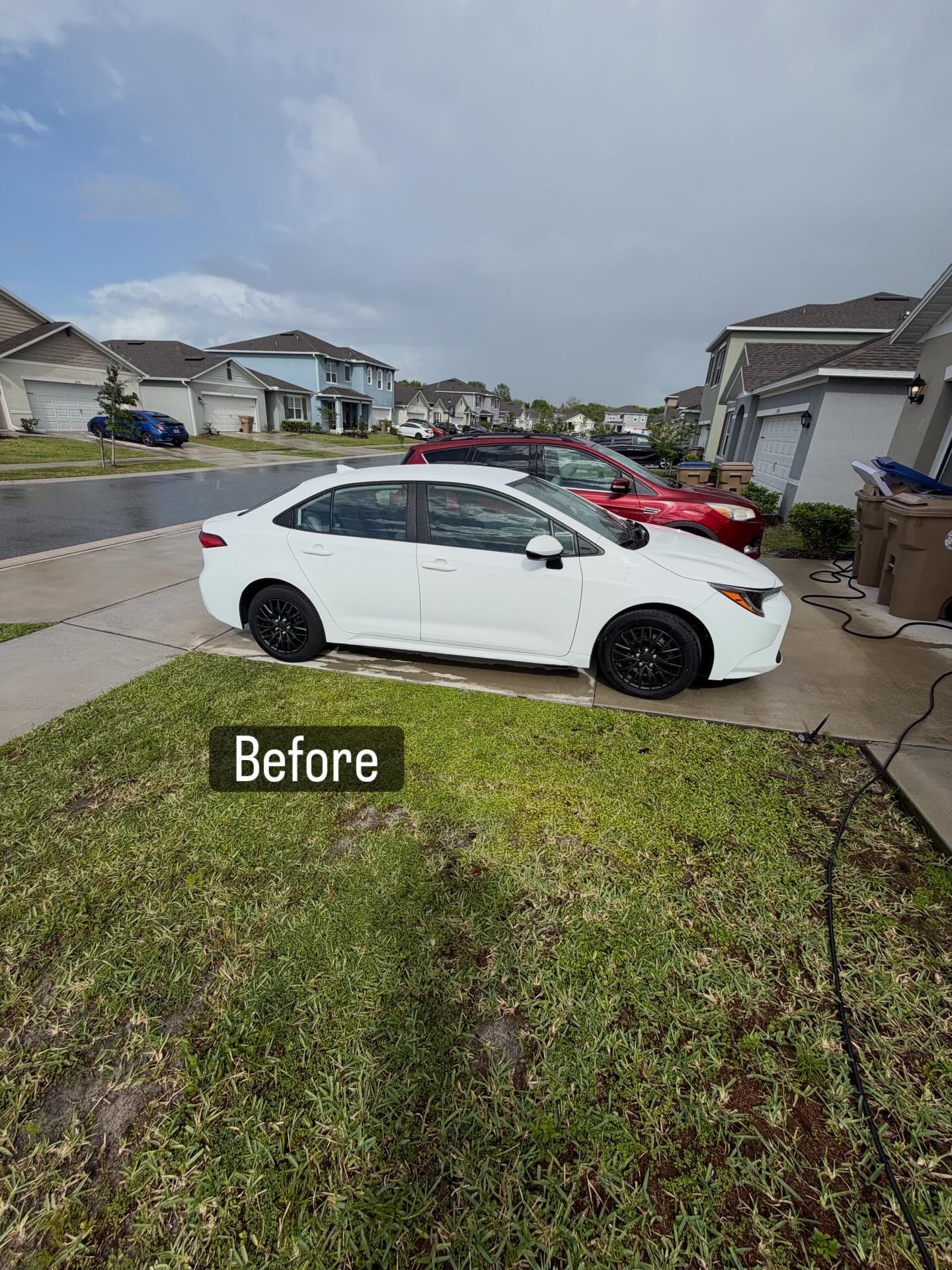 Before photo of a white sedan before mobile detailing service