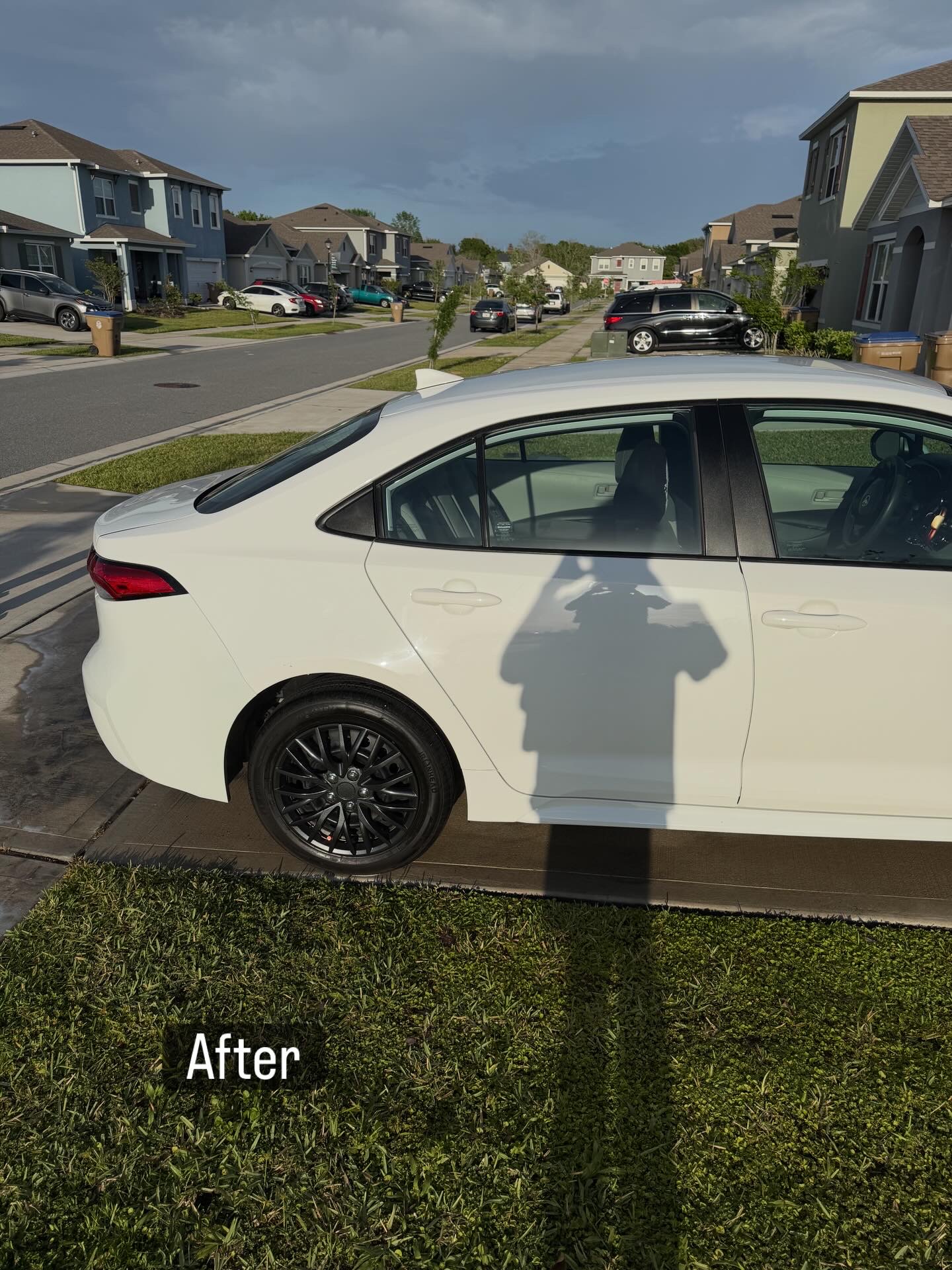 After photo of a white sedan with a cleaner, glossier finish